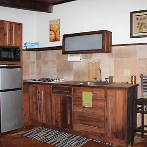 https://machukas-black-sand-apartment-1.comcaribbean.com